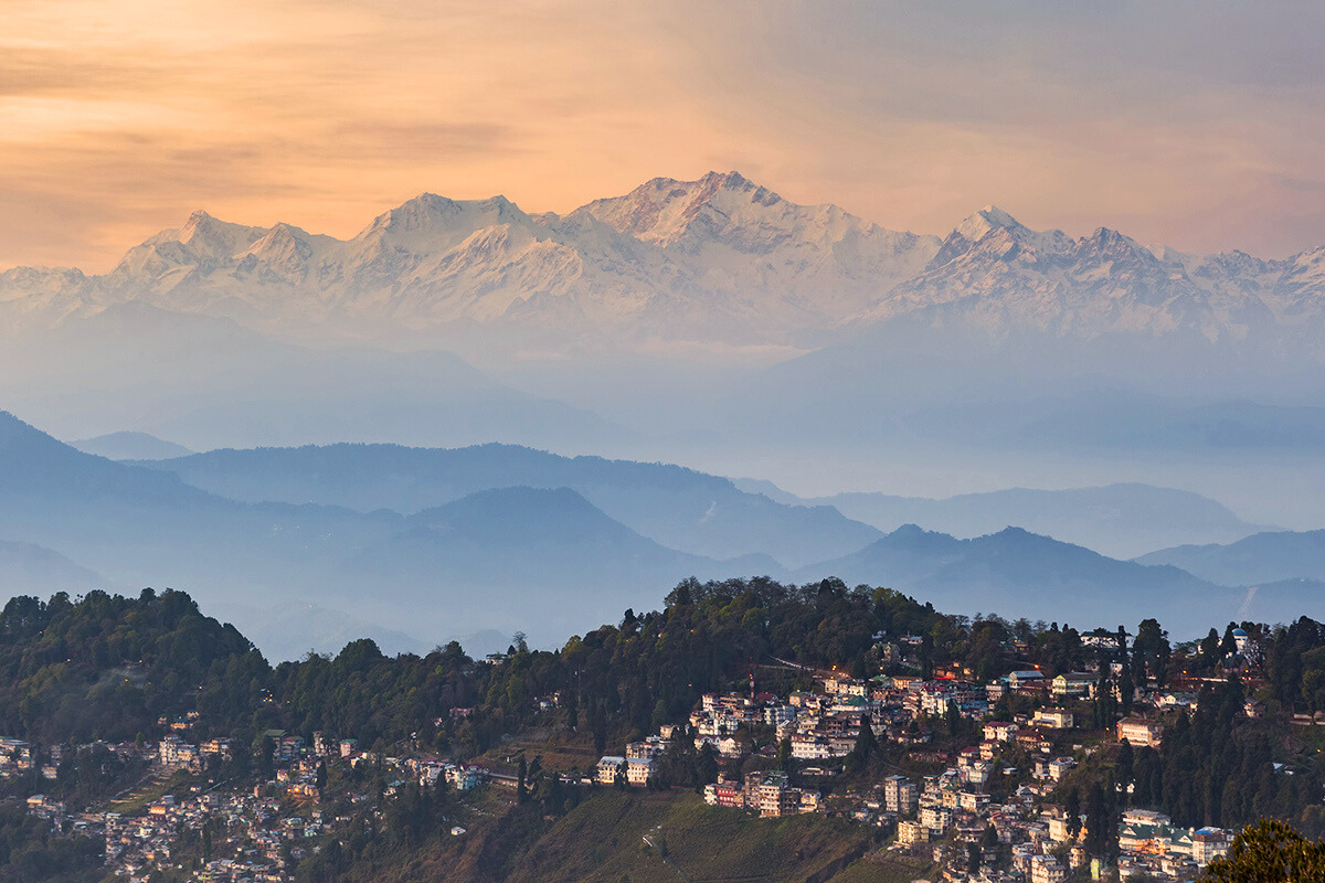 Nepal images containing mountains and sunset